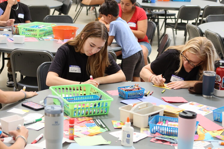 Women decorating cards