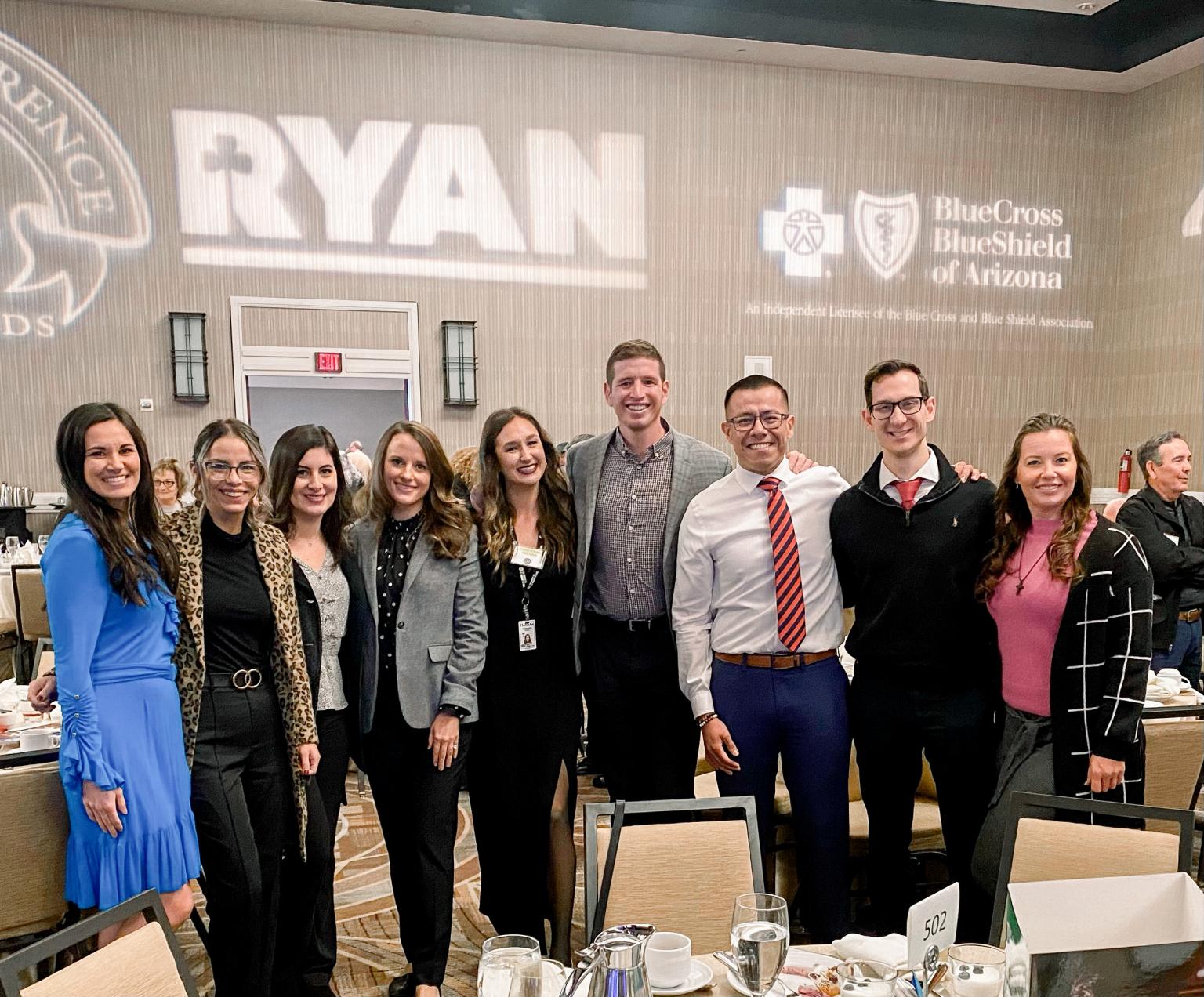 Group of young professionals posing together