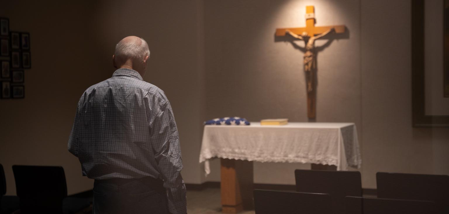 Michael Hefferman prays in the Oz Chapel