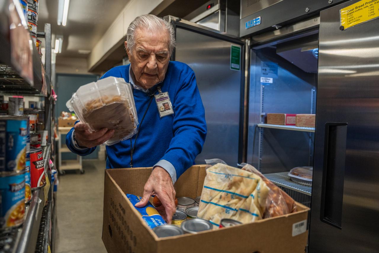 Sant&eacute; serving at the Sacred Heart food pantry in Prescott, Ariz.