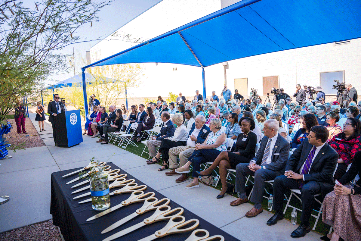 Ribbon cutting crowd shot