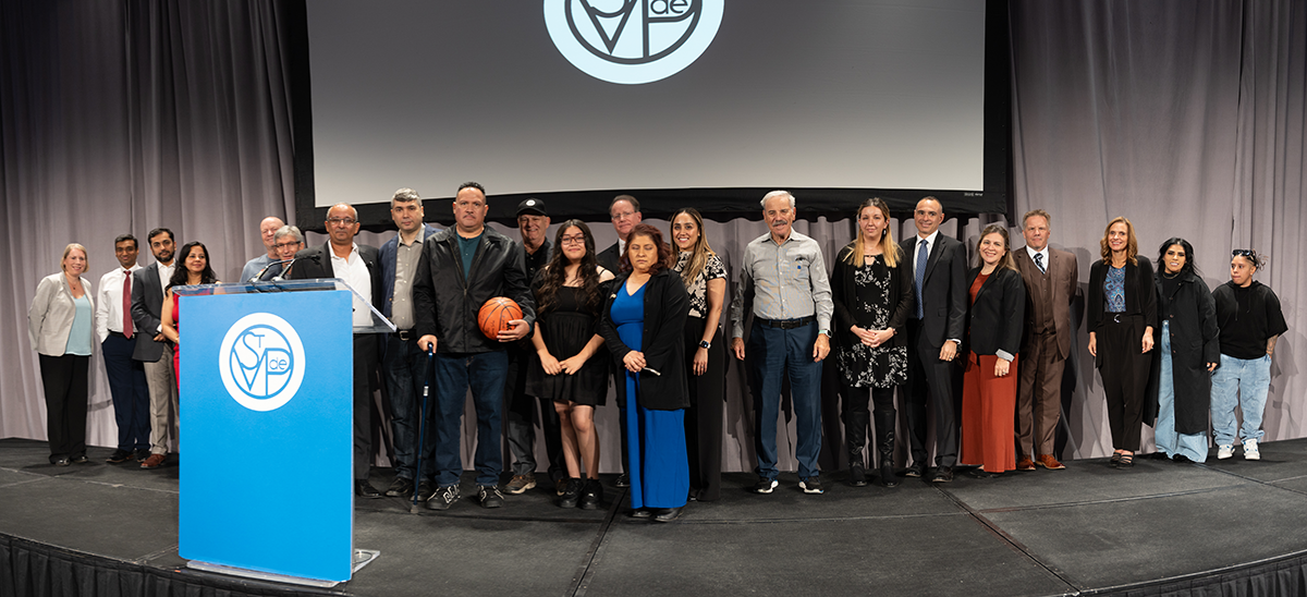 Many of the more than 50 providers who helped save Luis' life were called on stage to celebrate with Luis and present him a basketball as a symbol of hope for his continued recovery.