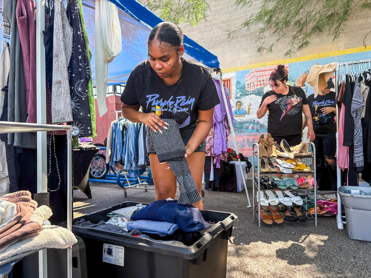 McKayla prepares the event before it opens.