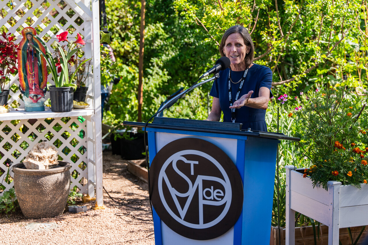 SVdP Rob and Melani Walton Endowed CEO Shannon Clancy gives a speech before the pressentation of the commendation.