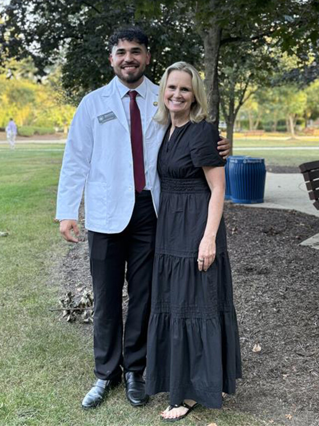 Russvel and Debbie pose together after an event.